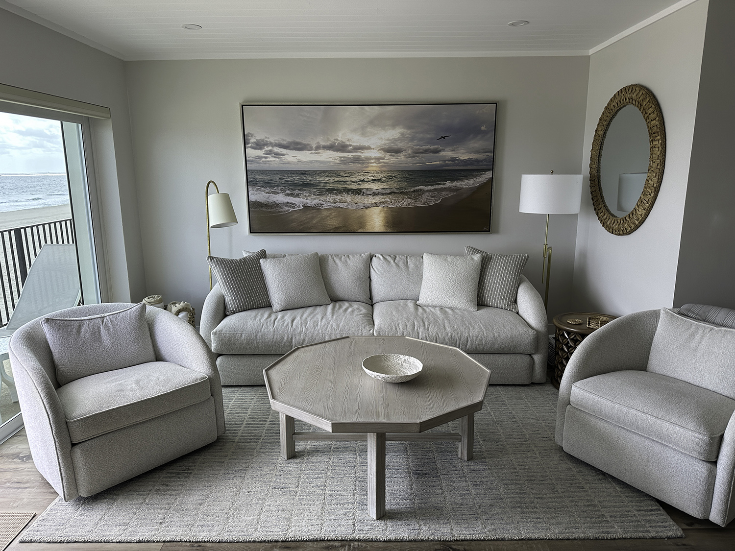 large beach sunrise photo hanging over a couch