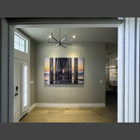 large photograph of the Scripps Pierr hanging in an entryway