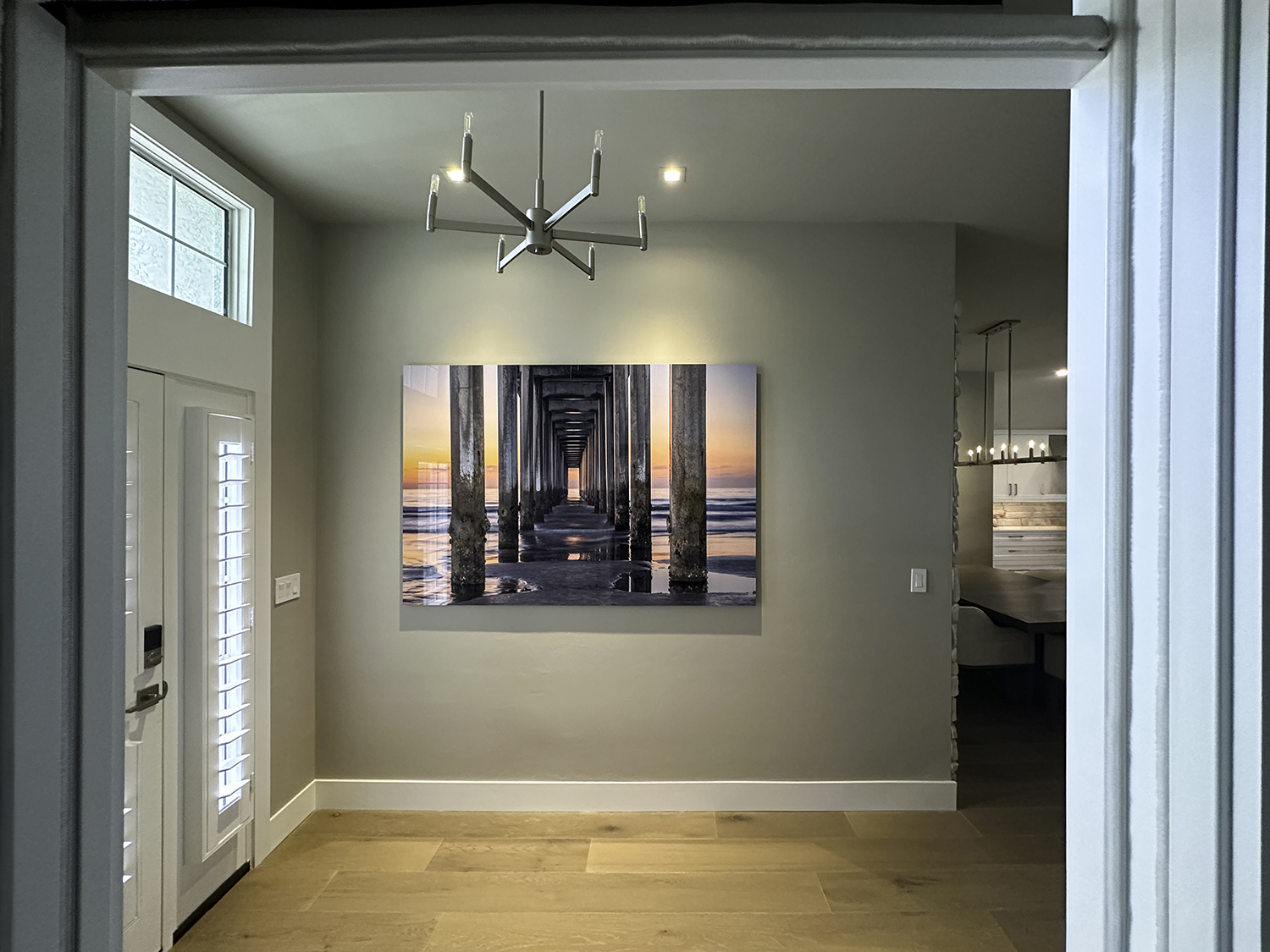 large photograph of the Scripps Pierr hanging in an entryway
