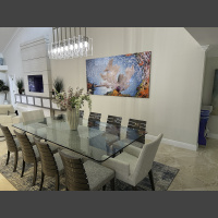 large art underwater coral reef photograph hanging above a dining room table