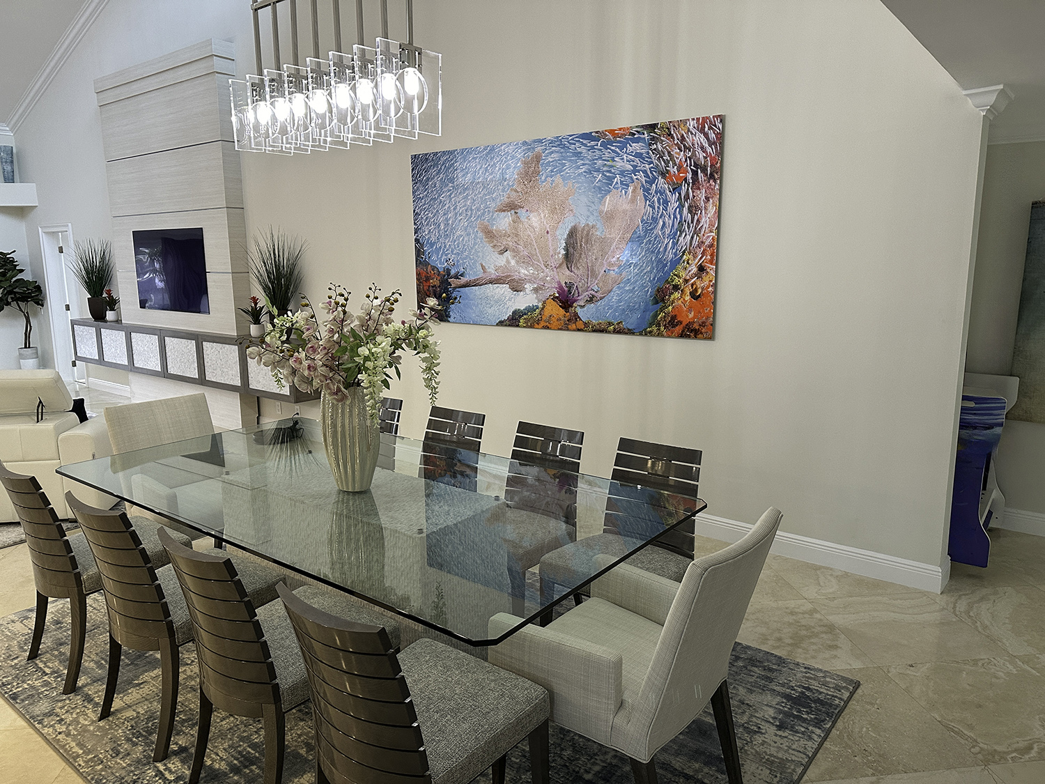 large art underwater coral reef photograph hanging above a dining room table
