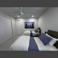 large fine art underwater photograph of an old broken pier, displayed in a guest bedroom