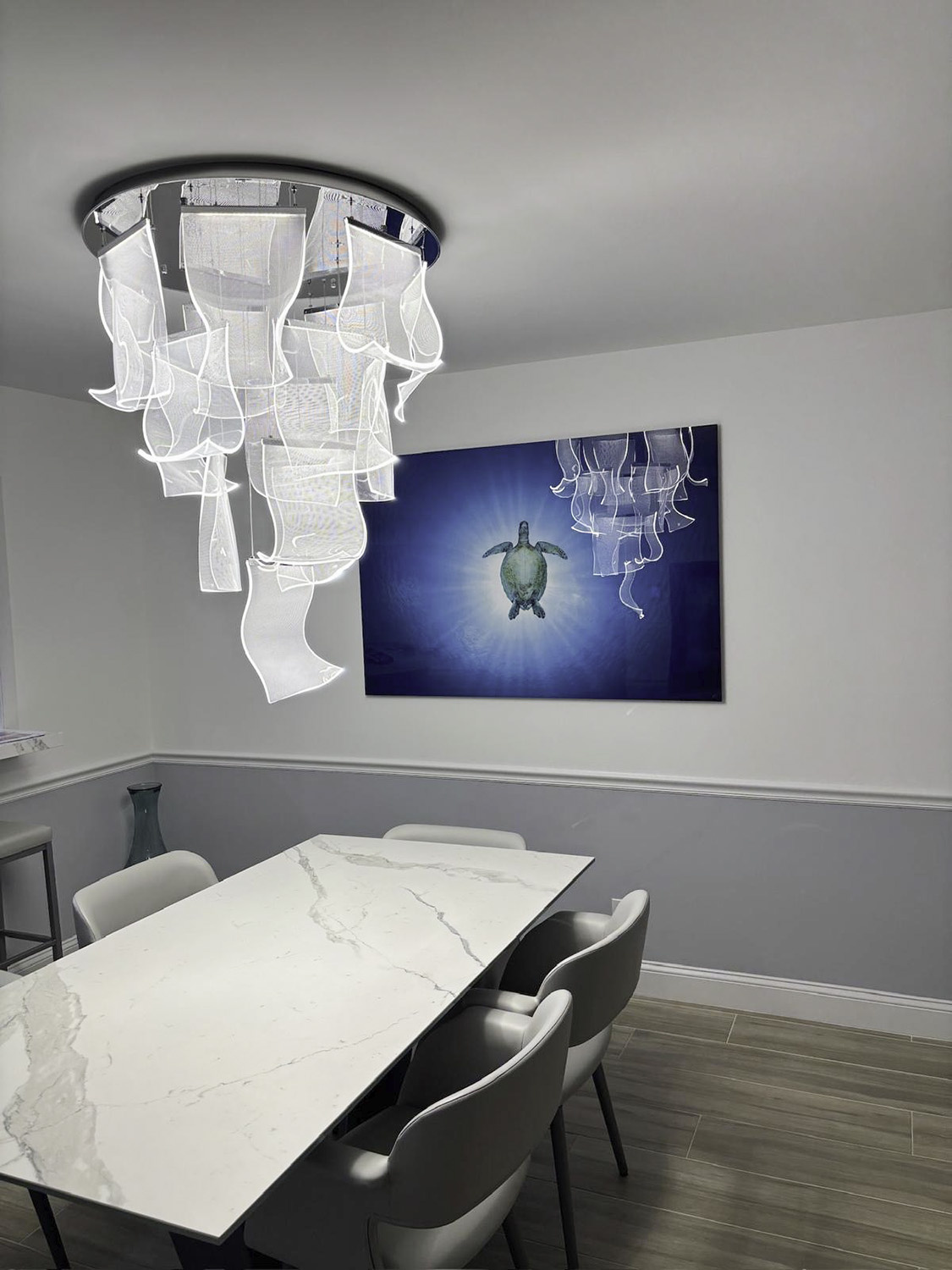 Turtle Eclipse of the Sun 60x40 in dining room underwater photograph of a green sea turtle hangs in an elegant dining room